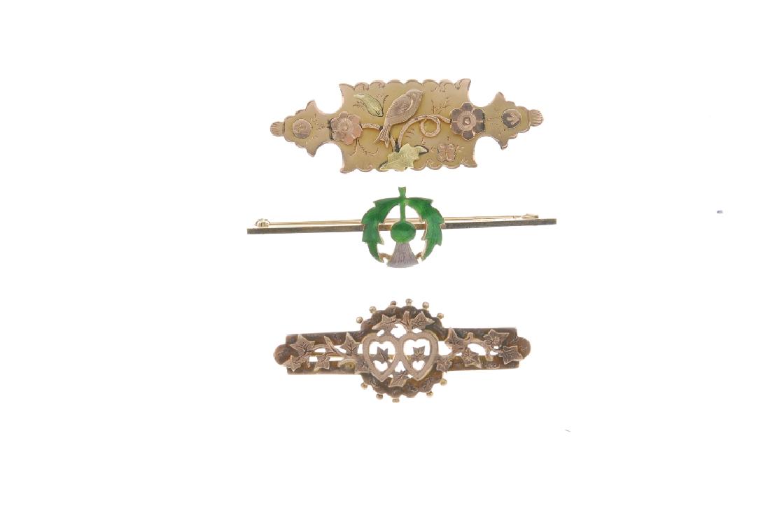 Three 9ct gold brooches. The first a bar brooch with (1 of 2)