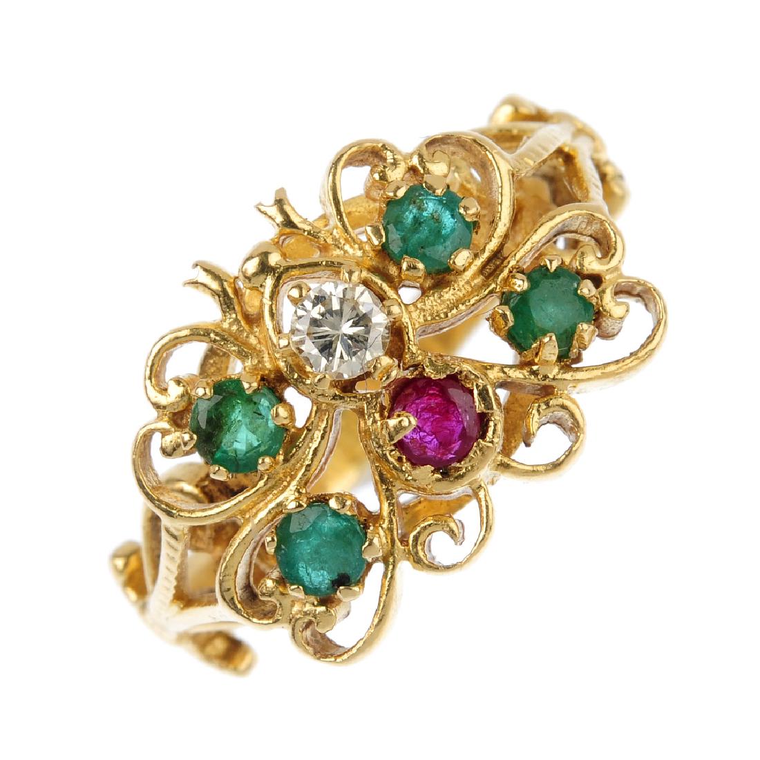 A diamond, ruby and emerald dress ring. Designed as a (1 of 3)