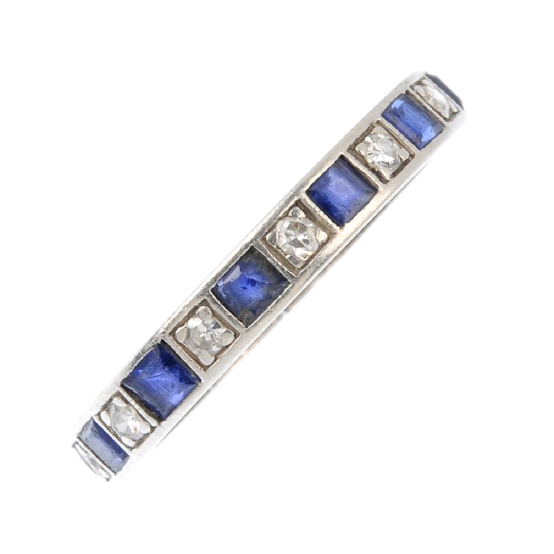 A sapphire and diamond full eternity ring. Designed as (1 of 3)