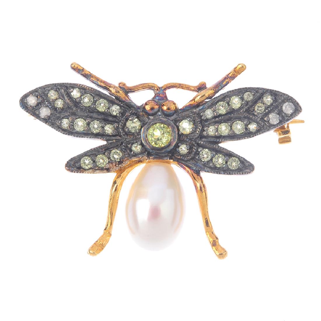 A gem-set novelty brooch. Designed as a winged insect, (1 of 2)