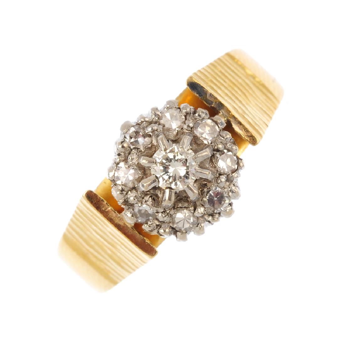 A diamond cluster ring. The brilliant-cut diamond, with (1 of 3)