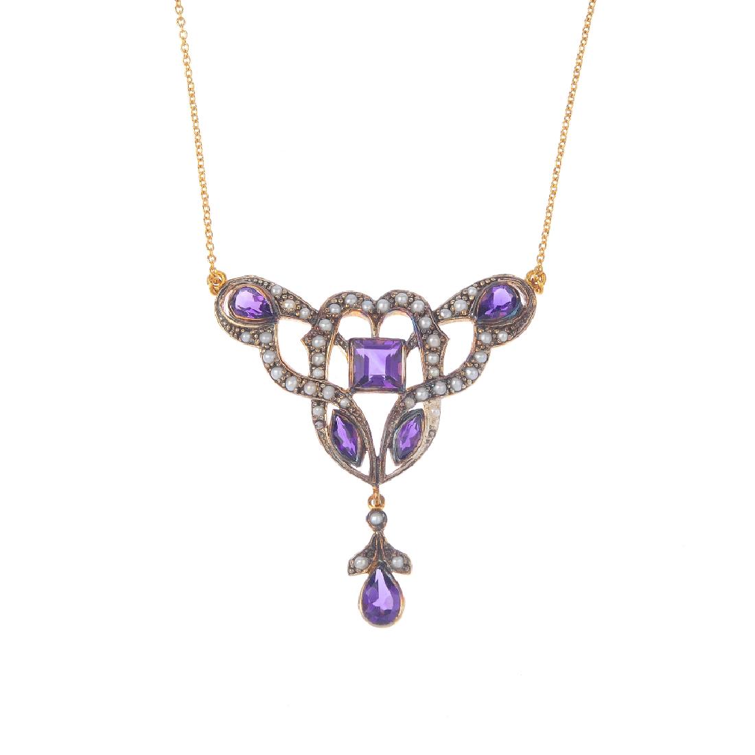 An amethyst and imitation pearl necklace. The (1 of 3)
