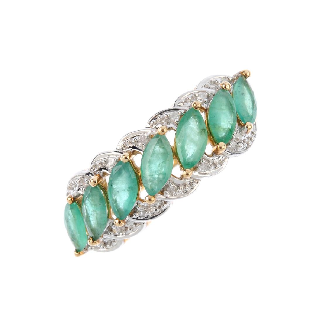A 9ct gold emerald and diamond ring. The marquise-shape (1 of 3)