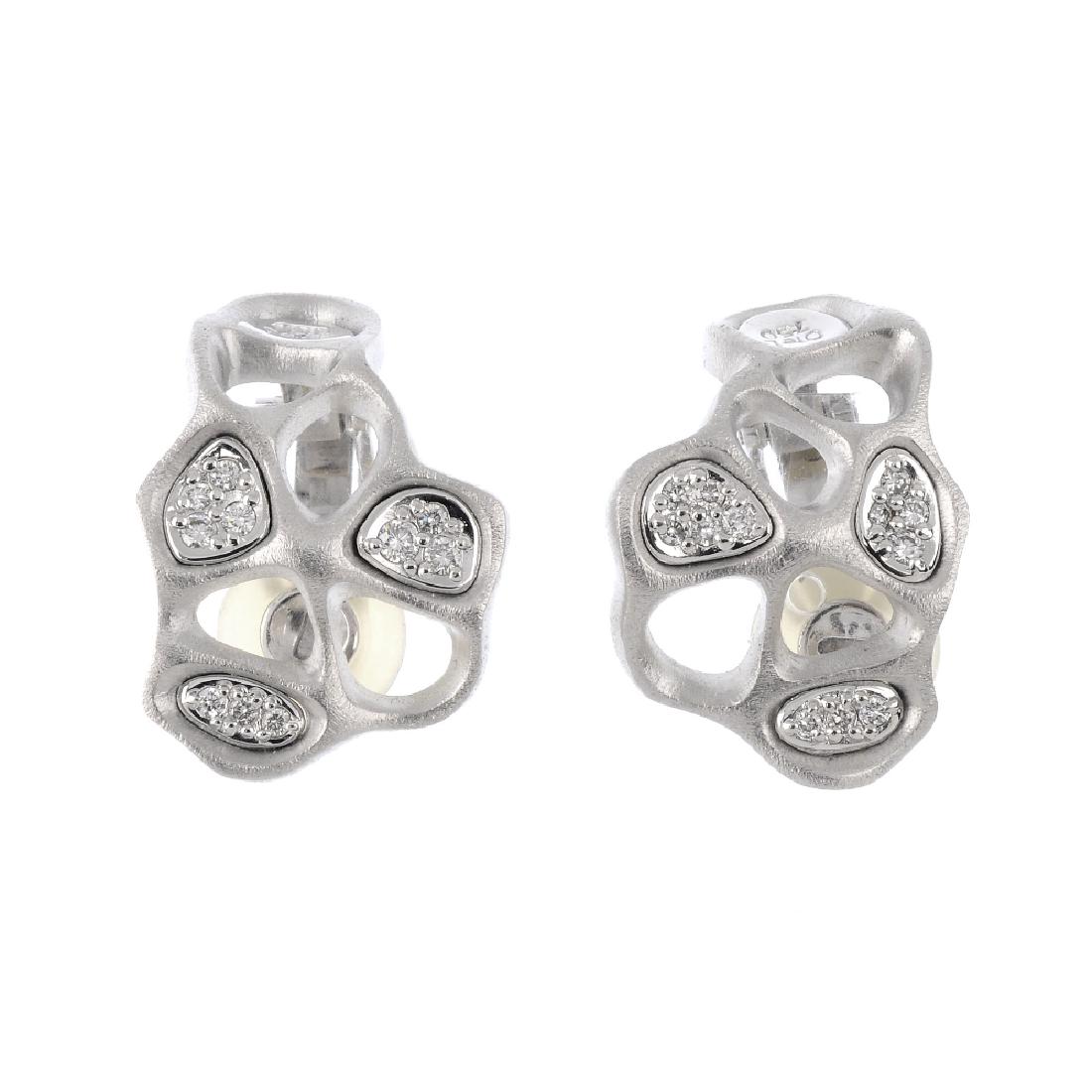 OLE LYNGGAARD - a pair of 18ct gold diamond 'Morning: OLE LYNGGAARD - a pair of 18ct gold diamond 'Morning Dew' earrings. Each of abstract, openwork design, inset with pave-set diamond clusters. Maker's mark for Ole Lynggaard. Estimated total diamond wei