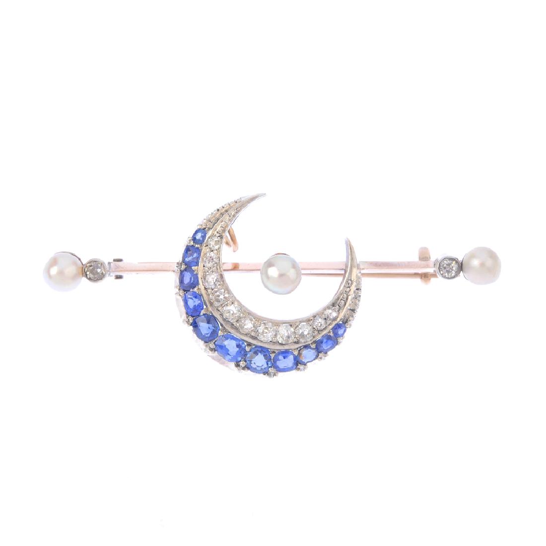 A diamond, sapphire and seed pearl brooch. The (1 of 2)