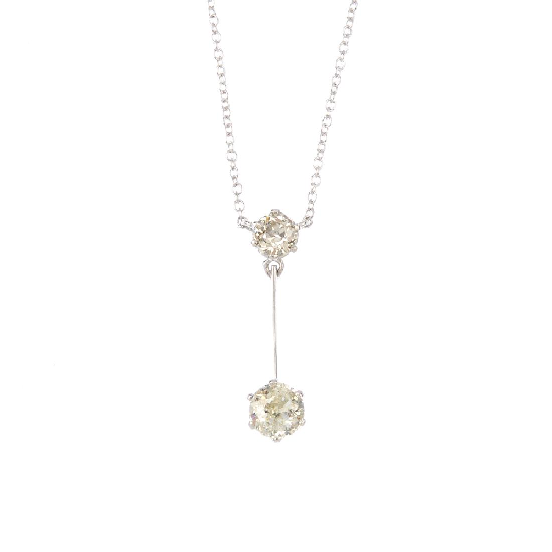 A diamond pendant. The old-cut diamond, suspended from (1 of 3)