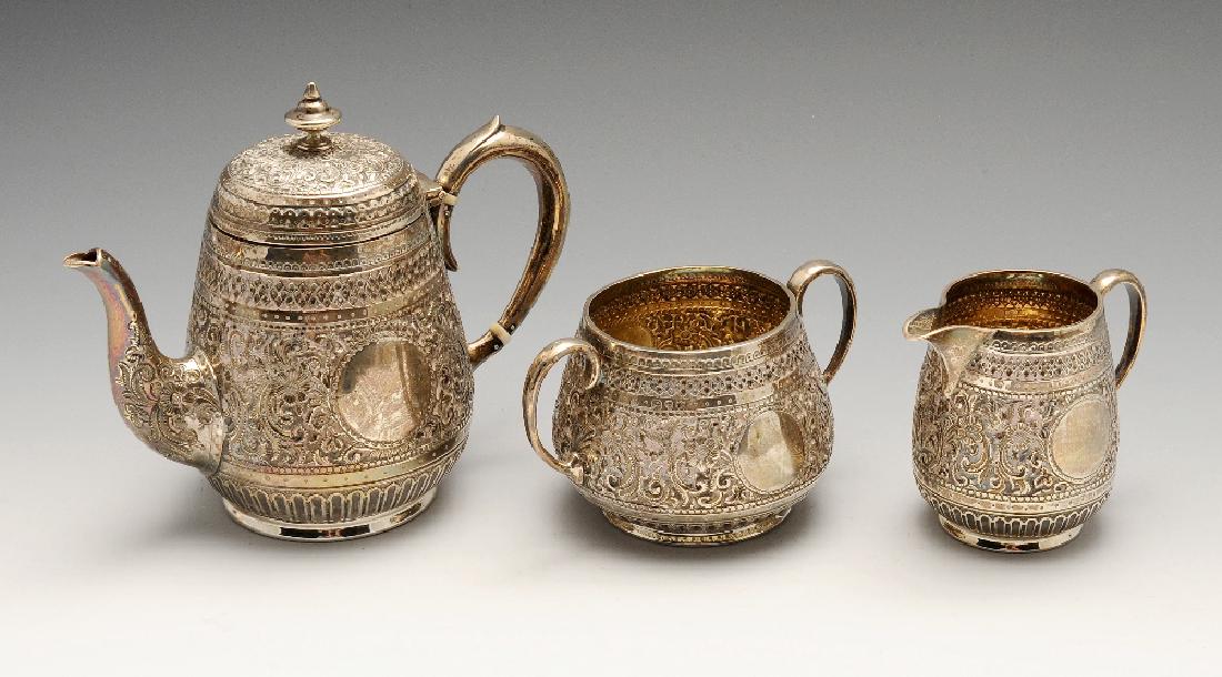 A late Victorian silver three piece bachelor tea (1 of 5)