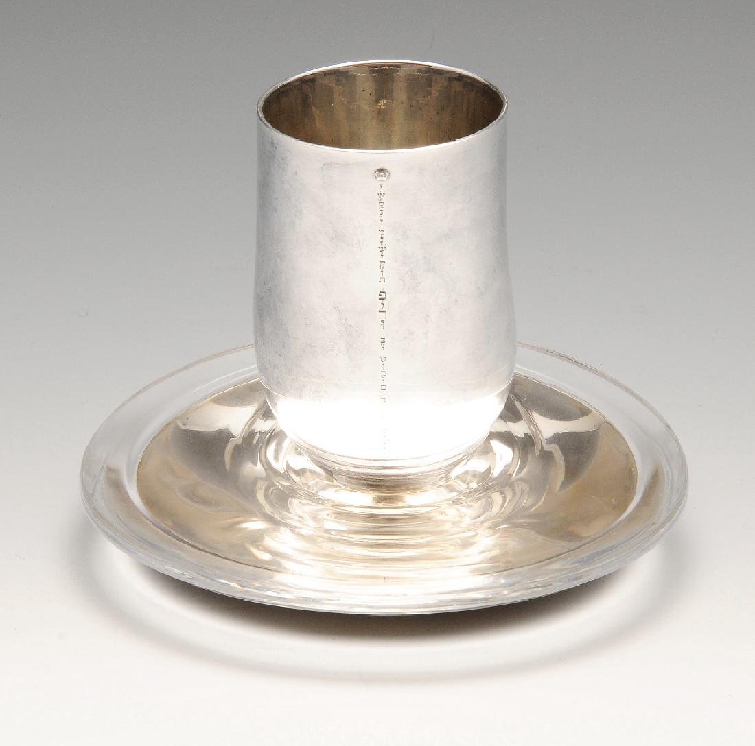 A modern cup and saucer, the cup of organic form (1 of 8)