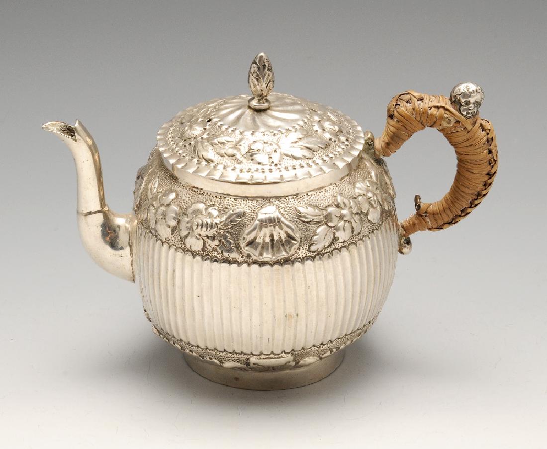 A nineteenth century continental teapot, the spherical (1 of 5)