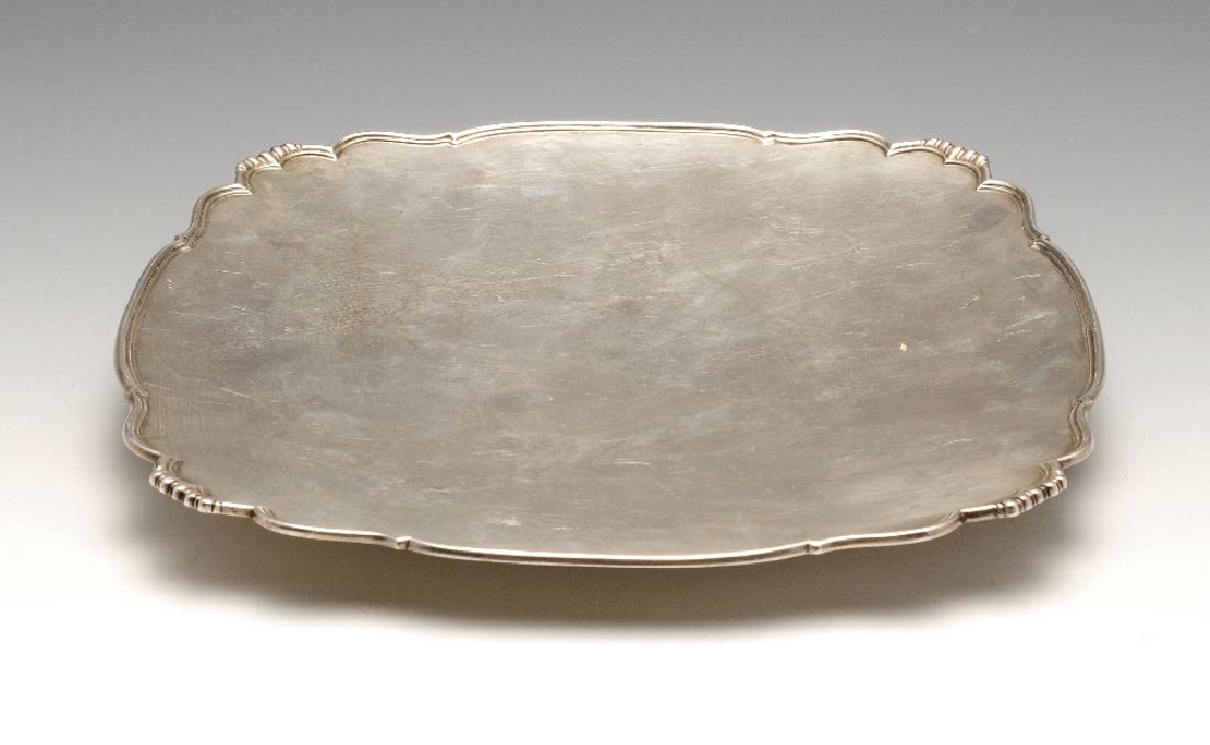 A mid-twentieth century silver cake dish, the plain (1 of 3)