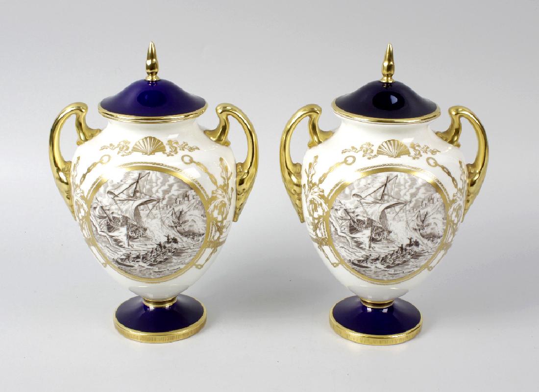 A pair of Royal Worcester porcelain limited edition: A pair of Royal Worcester porcelain limited edition RNLI vases. To commemorate the 150th Anniversary of the Royal National Lifeboat Institution, 1824-1974, each of twin-handled ovoid form with domed m
