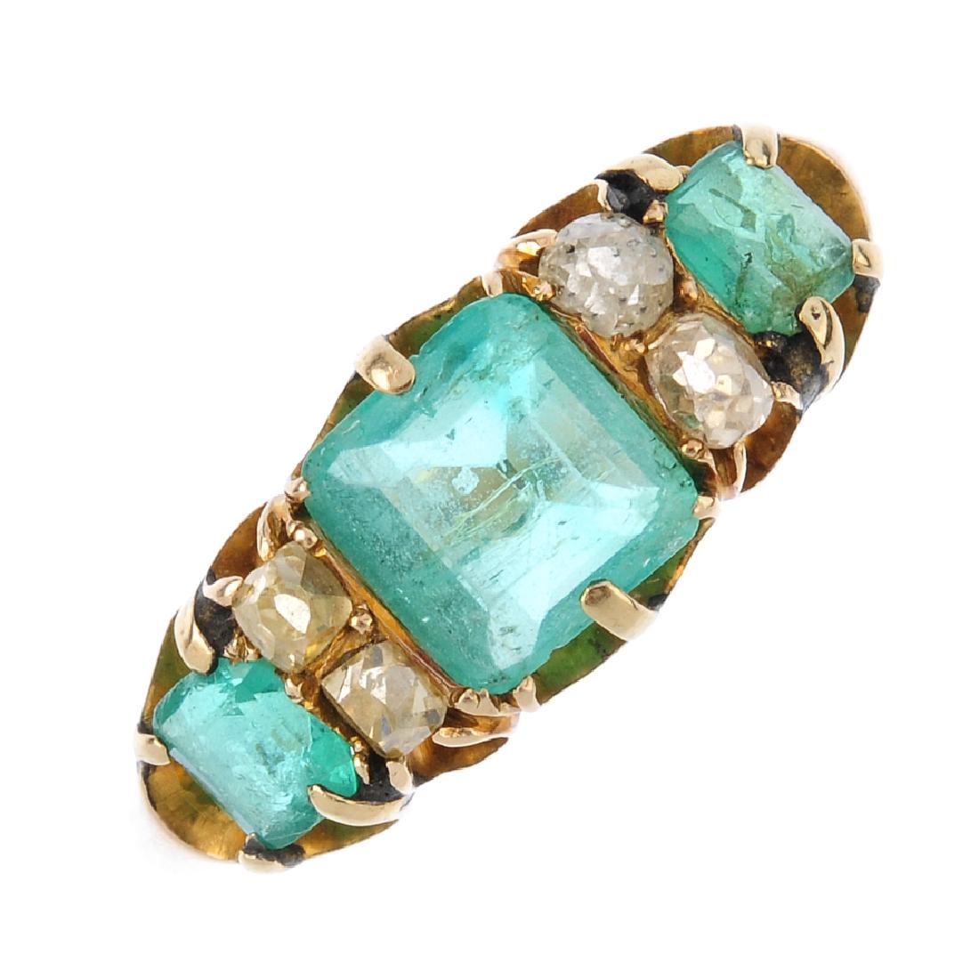 An emerald and diamond dress ring. The square-shape (1 of 3)