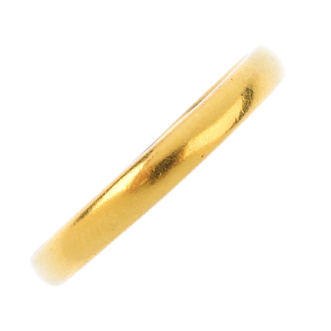 A mid 20th century 22ct gold band ring. Hallmarks for (1 of 1)