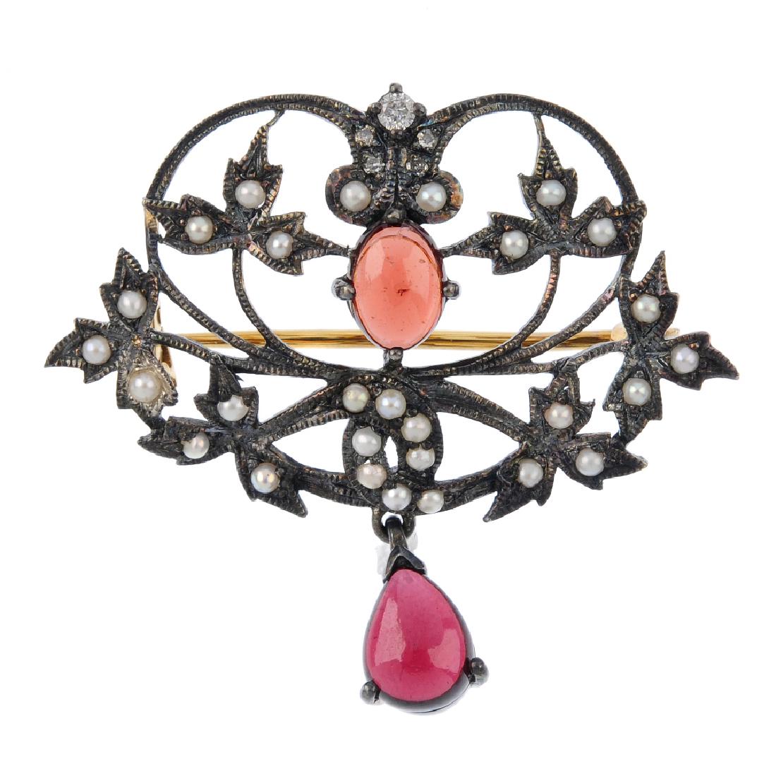 A diamond, garnet and seed pearl brooch. Designed as a (1 of 2)