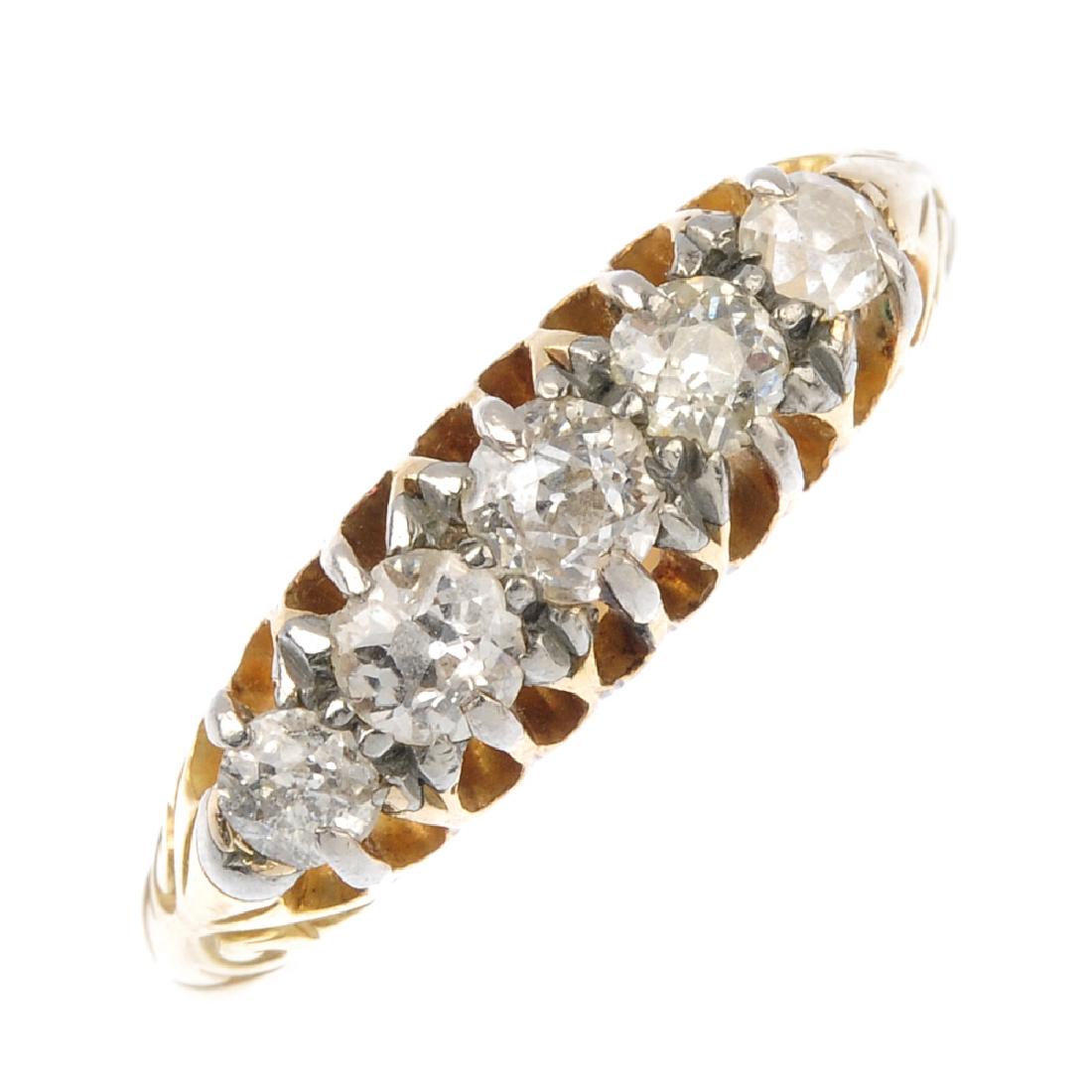An 18ct gold diamond five-stone ring. The graduated (1 of 3)