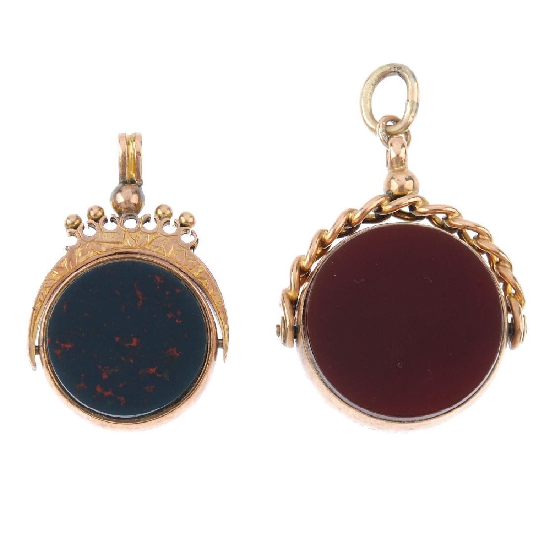 Two 9ct gold hardstone swivel fobs. To include a late (1 of 2)