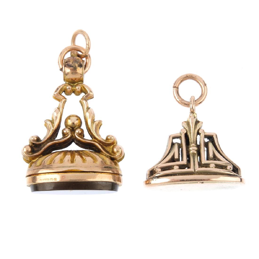 Two fobs. To include an Edwardian 9ct gold locket fob, (1 of 2)