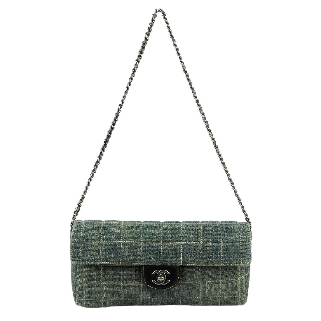 CHANEL - a quilted denim Chocobar handbag. Featuring a (1 of 5)