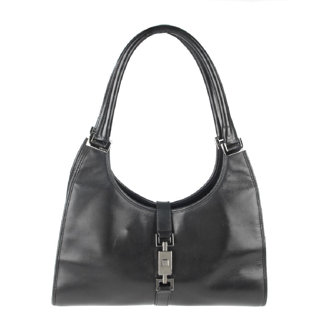 GUCCI - a black Bardot handbag. Designed with a black (1 of 4)