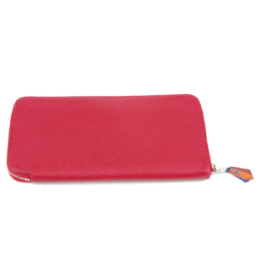 HERMÈS - a Silk'In long wallet. Designed with a ruby (1 of 4)