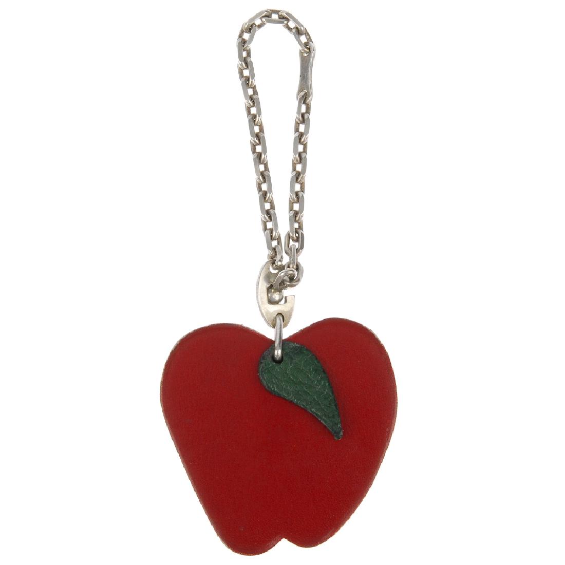 HERMÈS - a fruit key chain. Designed as a red leather (1 of 3)