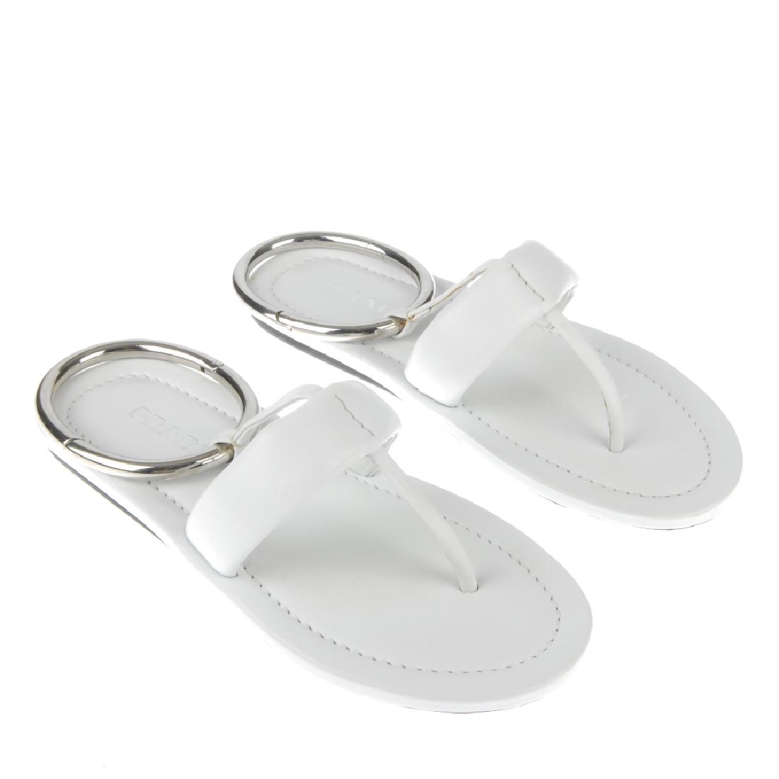PRADA - a pair of flat leather sandals. Crafted from (1 of 4)