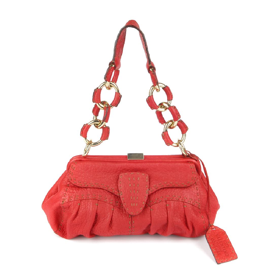 VALENTINO GARAVANI - a red leather handbag. Designed (1 of 5)