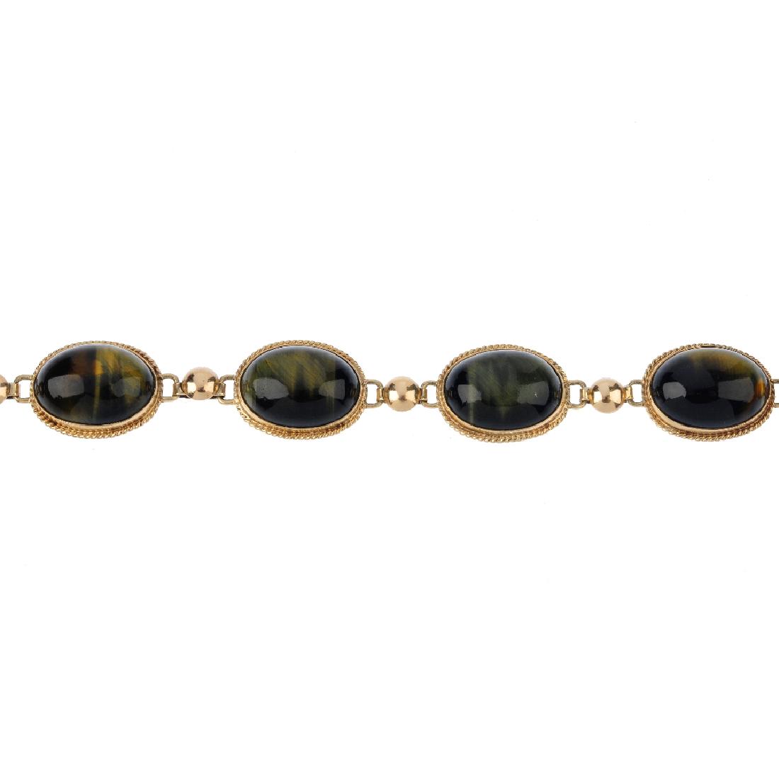 A tiger's eye bracelet. Designed as a series of oval (1 of 3)