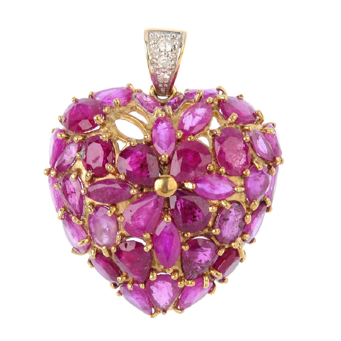 A 9ct gold ruby and diamond pendant. Of heart-shape (1 of 1)