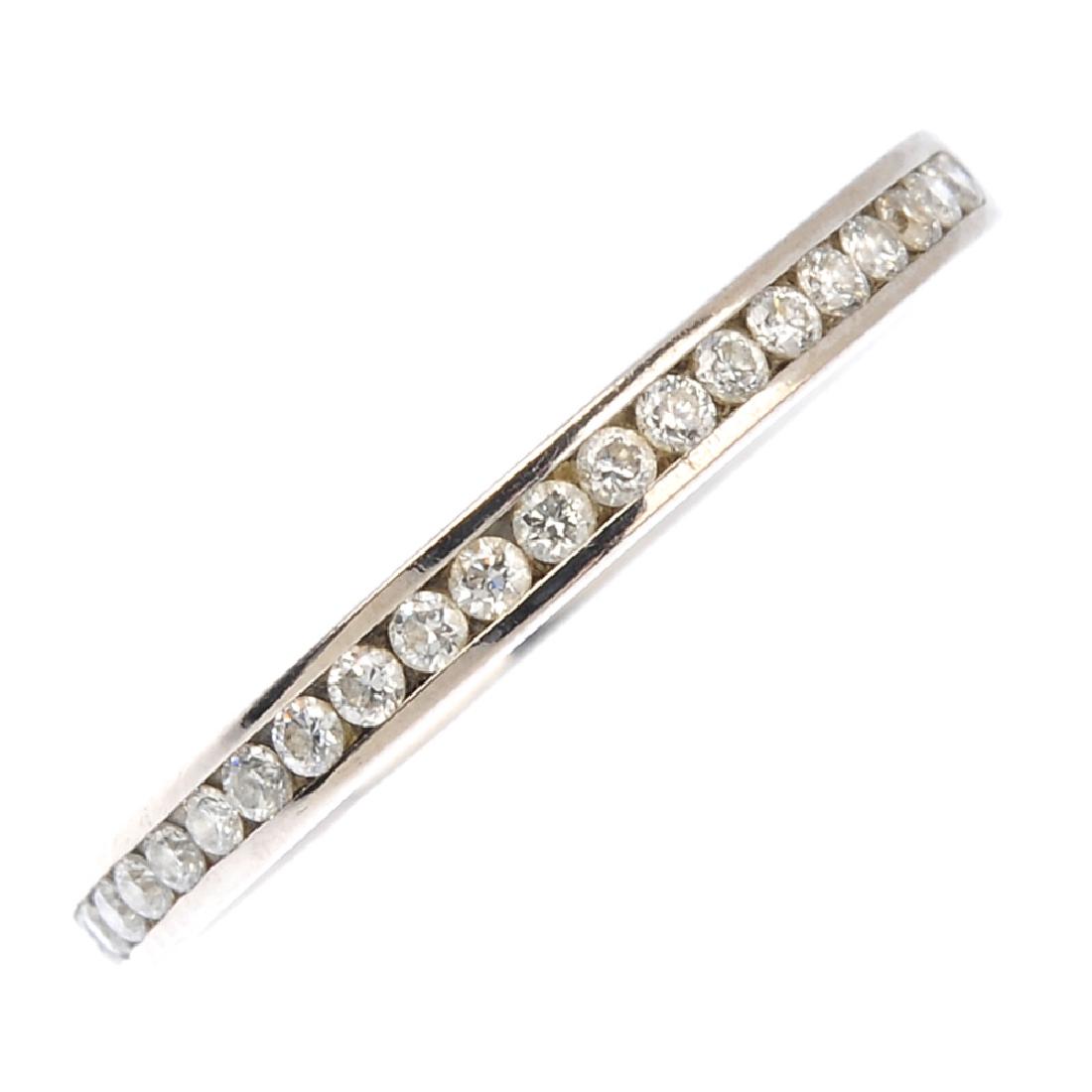An 18ct gold diamond half eternity ring. The (1 of 1)