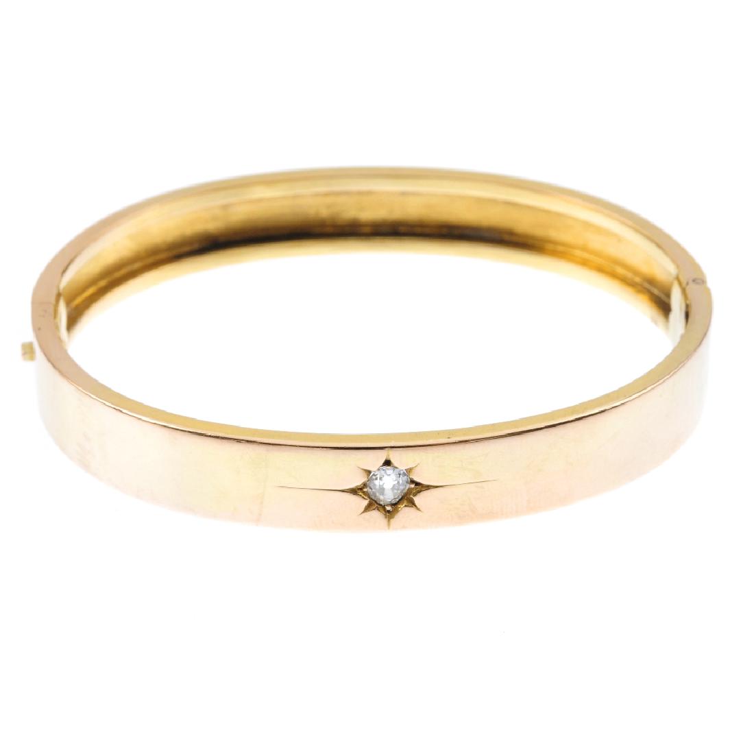 A diamond hinged bangle. The polished bangle, with (1 of 1)