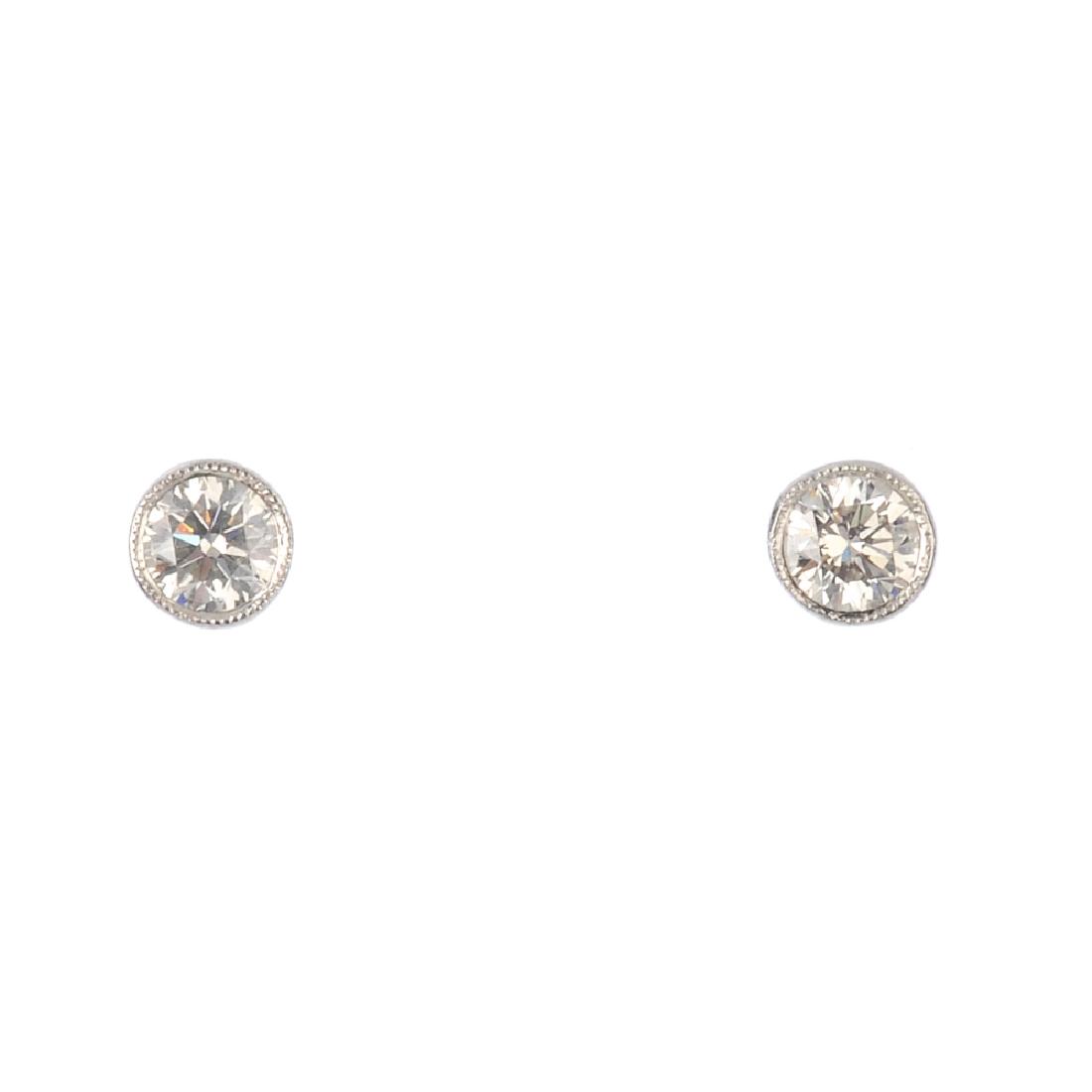 A pair of brilliant-cut diamond stud earrings. (1 of 1)