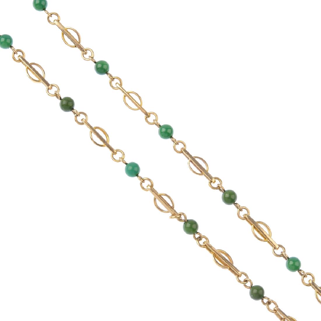 (204684) A 9ct gold gem-set necklace. The green gem (1 of 1)