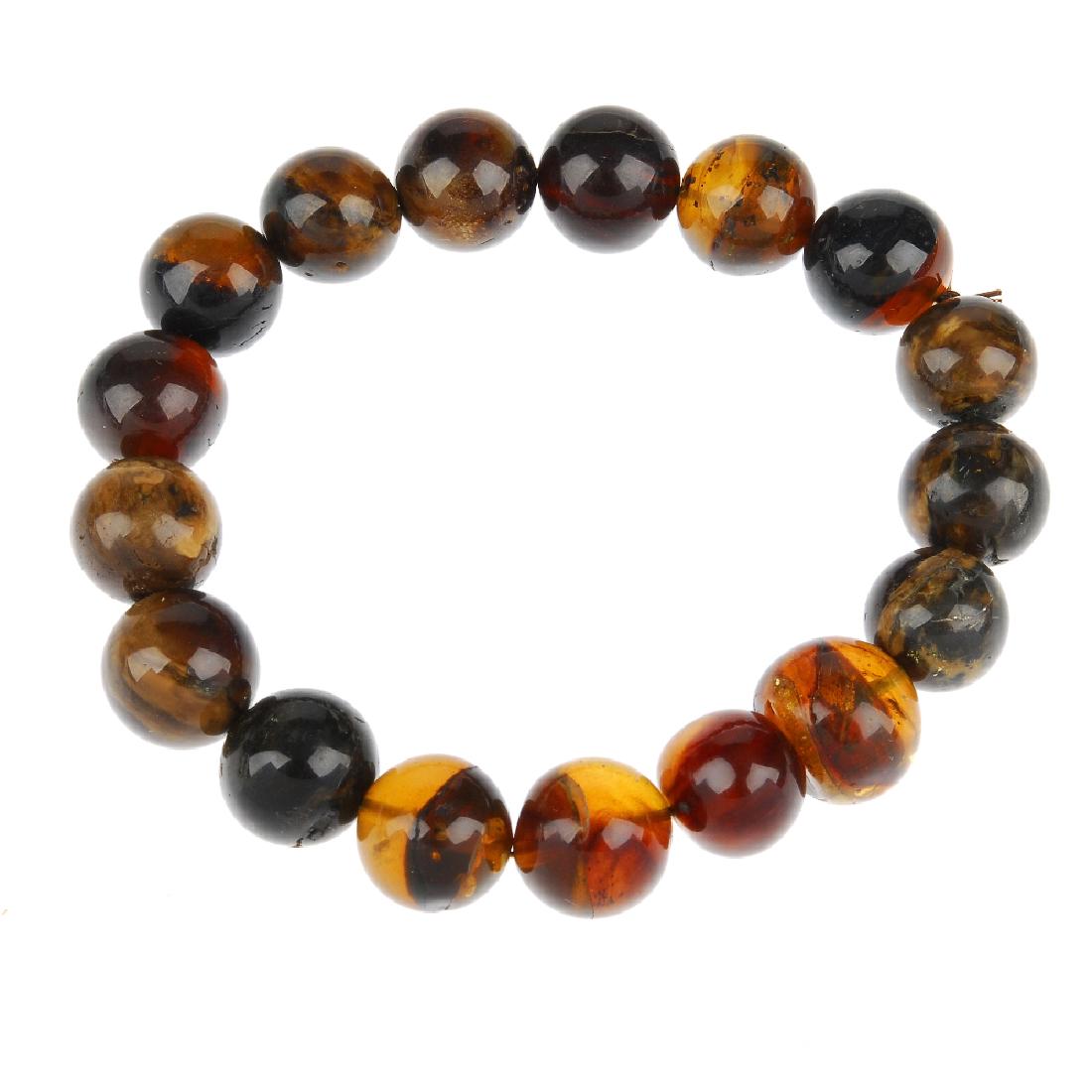 A natural Burmese amber bead bracelet. The spherical (1 of 2)