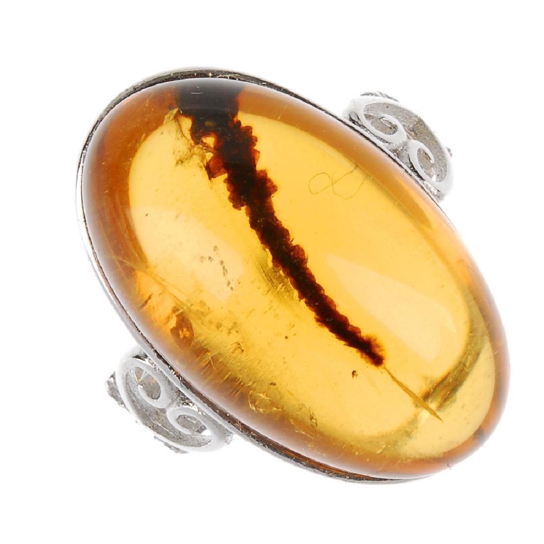 A natural Burmese amber ring. The oval-shape cabochon (1 of 3)