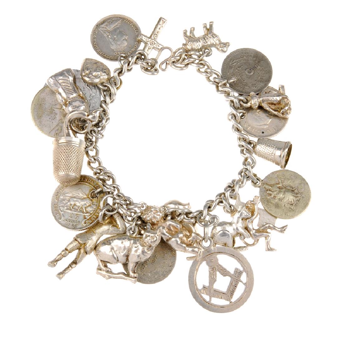 Four charm bracelets. Two curb link chains, a filled (1 of 3)