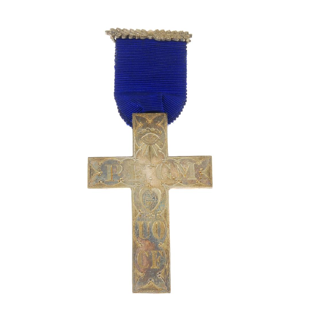 A selection of silver and white metal jewellery. To: A selection of silver and white metal jewellery. To include a silver Masonic medal of cross shape with engraved lettering, eye and heart to one side and personal engraving to the other, together with 