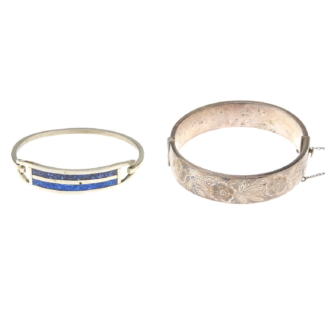 A selection of silver and white metal bangles. To (1 of 4)