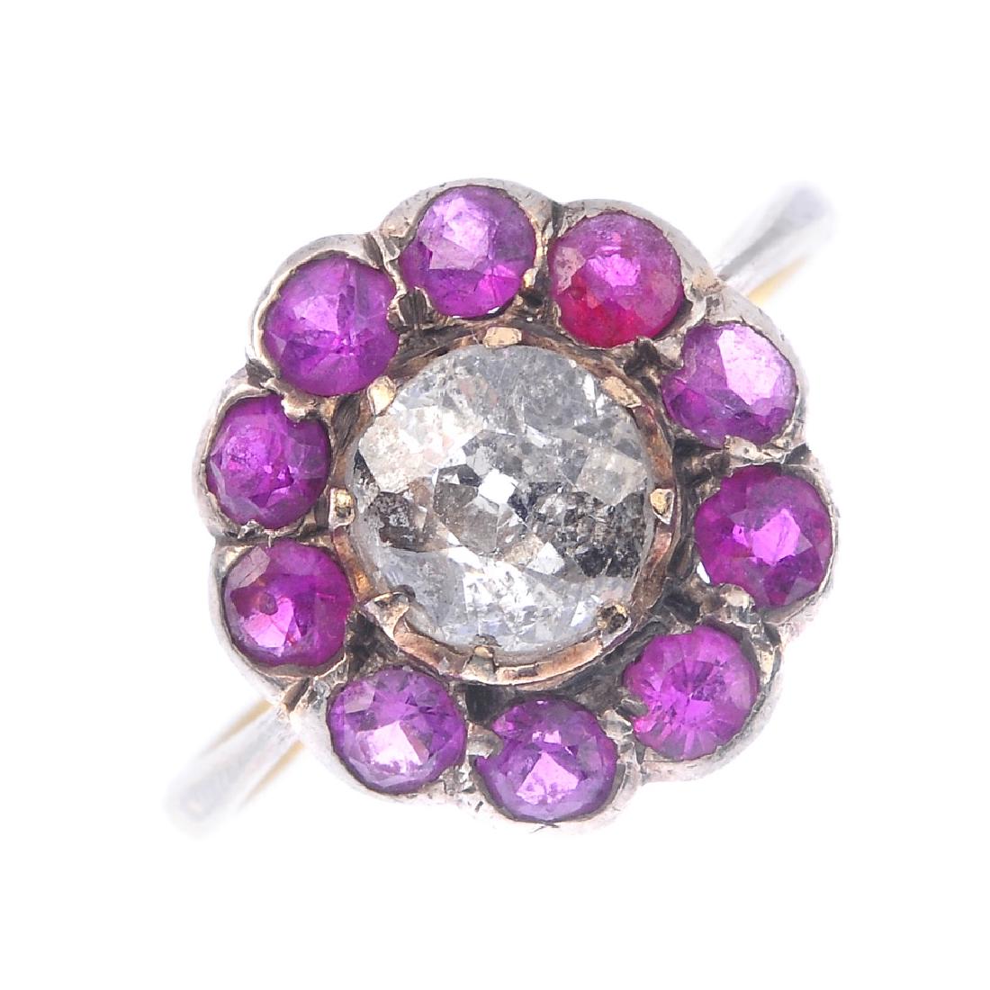 A ruby and diamond cluster ring. The old-cut diamond, (1 of 4)