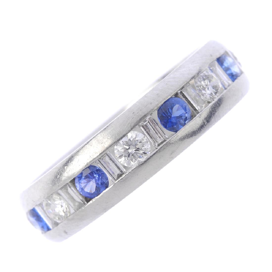 A sapphire and diamond half eternity ring. The (1 of 3)