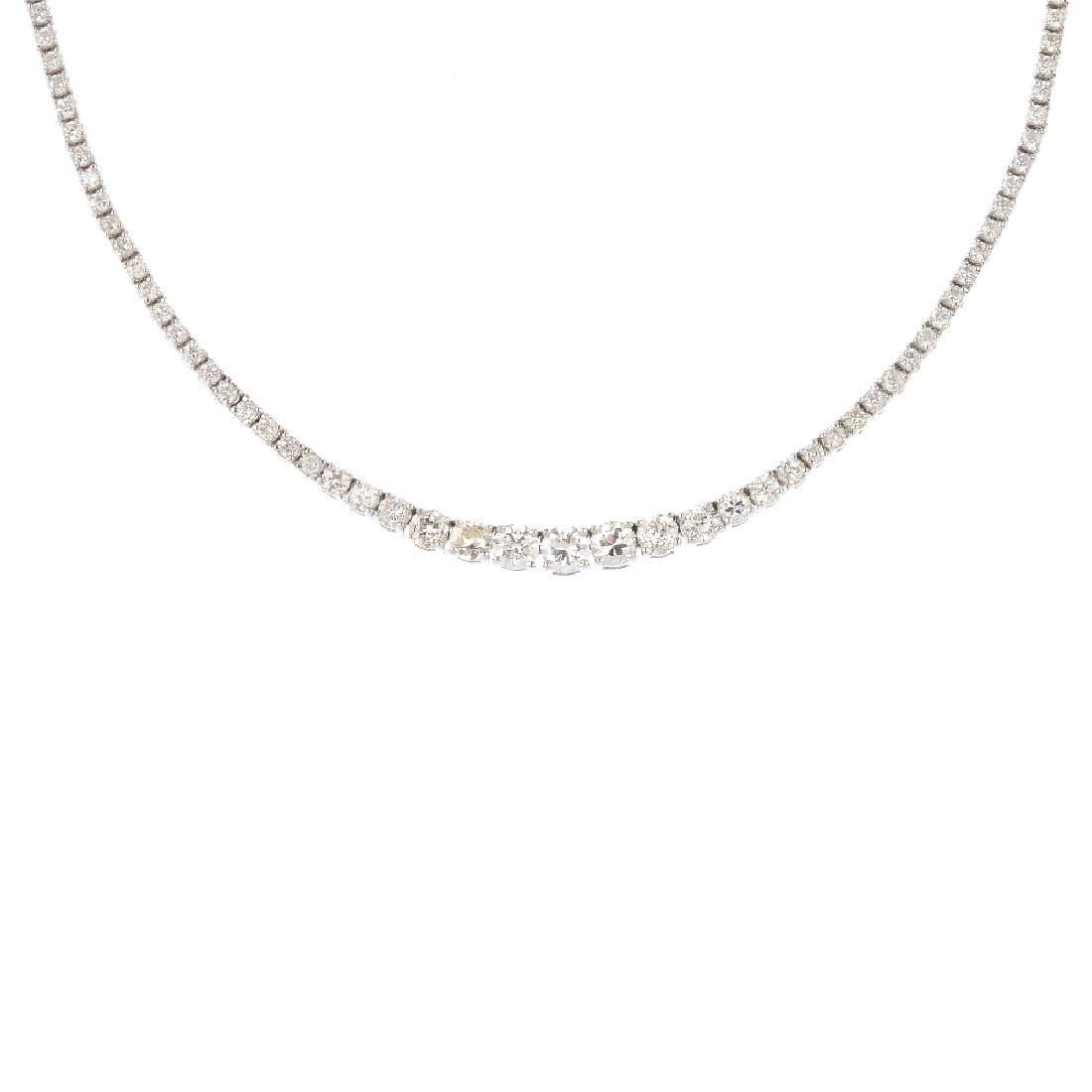 A diamond necklace. Designed as a series of graduated: A diamond necklace. Designed as a series of graduated old and brilliant-cut diamonds, with brilliant-cut line sides and push-piece clasp. Estimated total diamond weight 4 to 4.50cts. Length 42cms. Wei