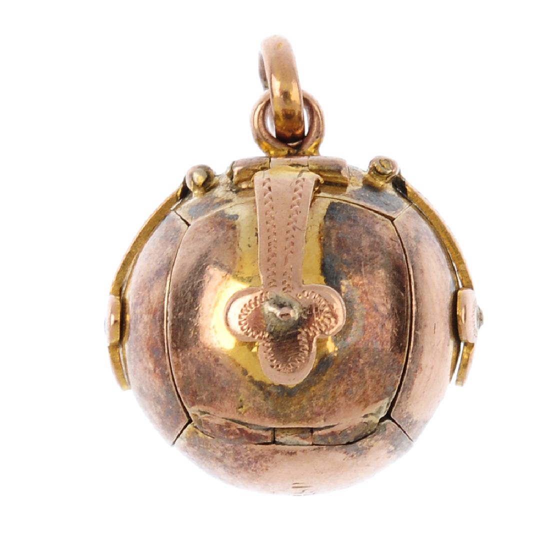 A Masonic ball pendant. The sphere, unfurling to reveal (1 of 3)