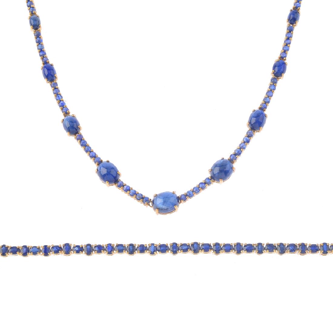 A 9ct gold sapphire necklace and bracelet. The bracelet (1 of 3)