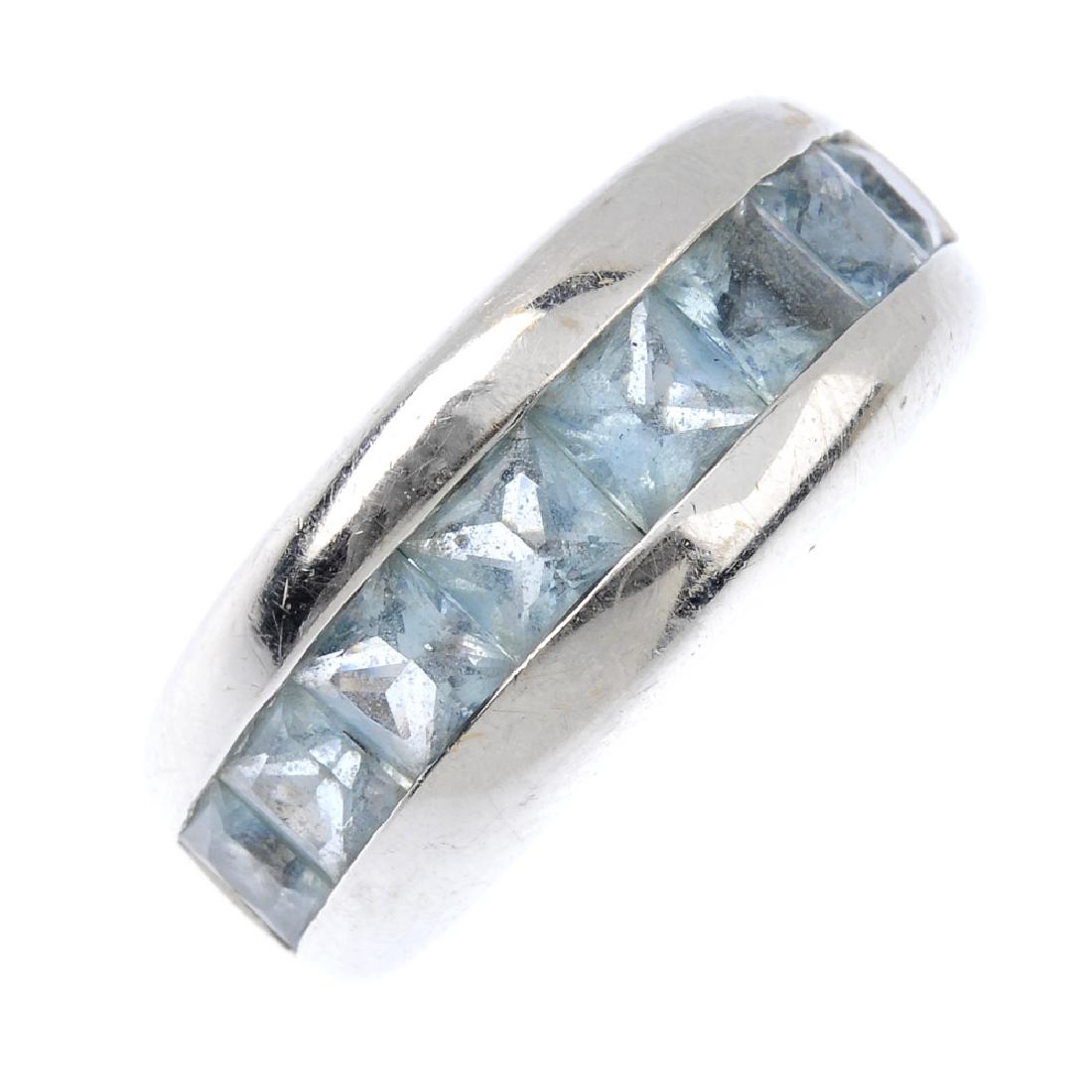 An aquamarine band ring. The slightly graduated (1 of 3)