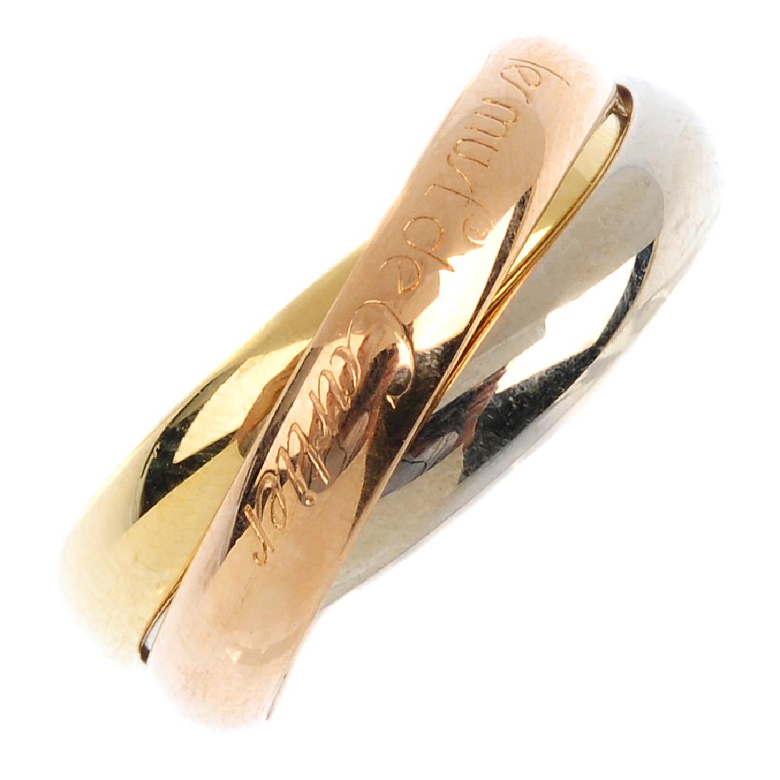 CARTIER - a 'Must De Cartier' trinity ring. Designed as (1 of 3)