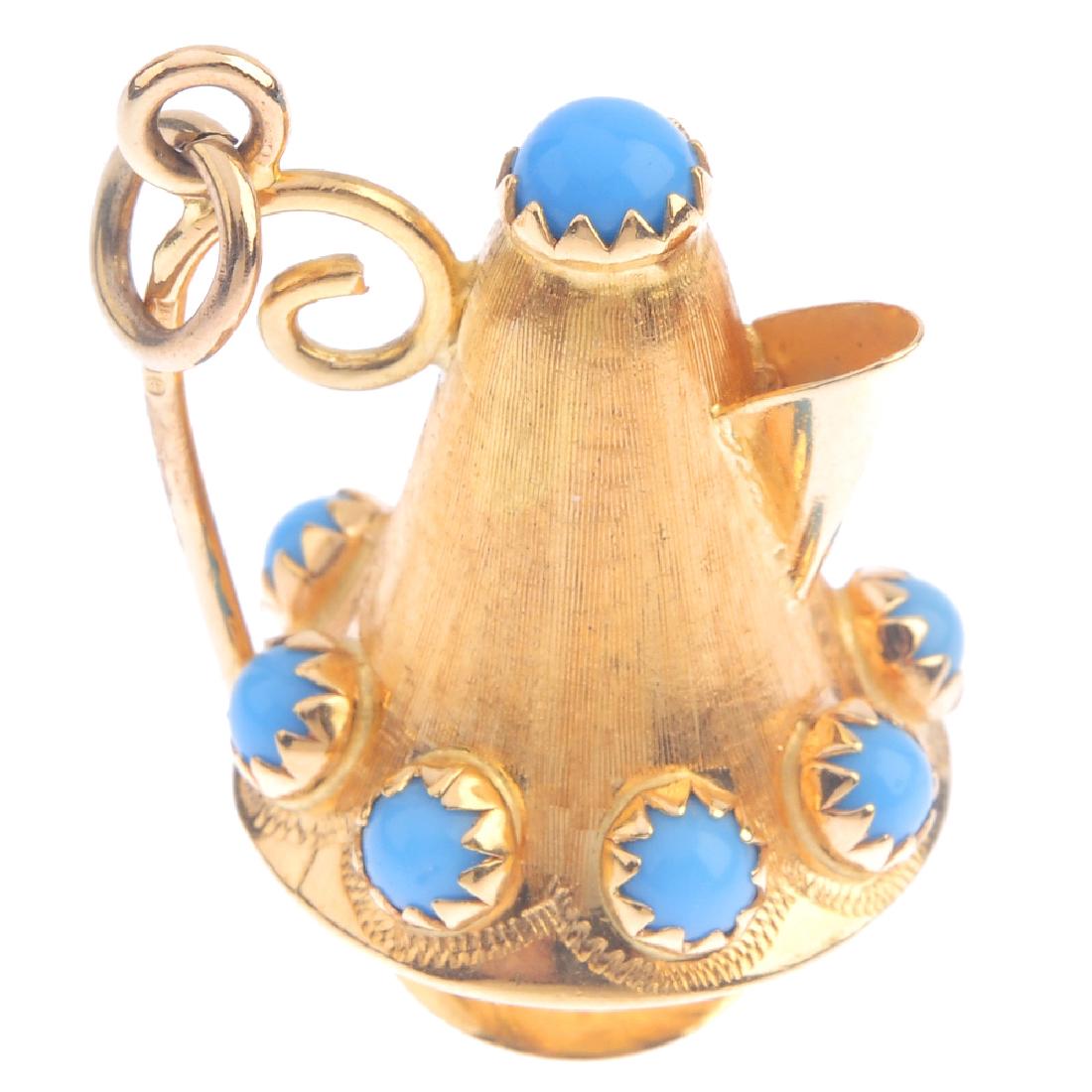 An 18ct gold turquoise pendant. Designed as a stylised (1 of 3)