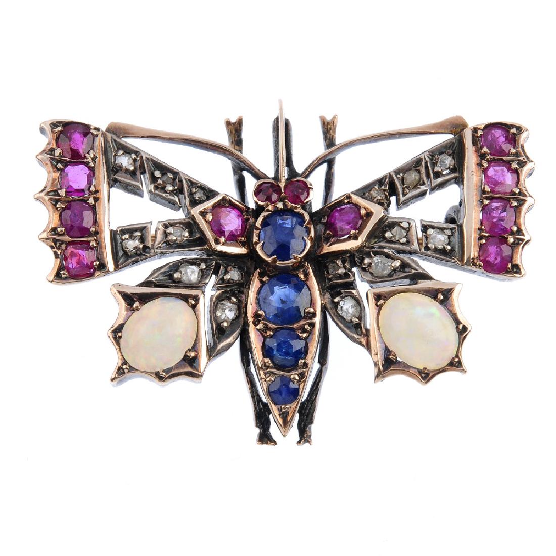 A late Victorian diamond and gem-set butterfly brooch. (1 of 2)