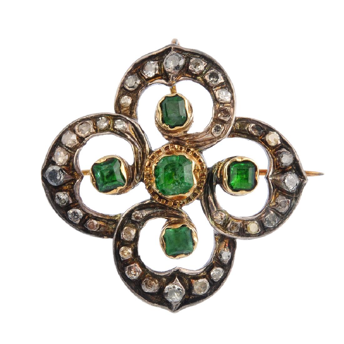 A diamond and gem-set brooch. Of openwork design, the (1 of 2)