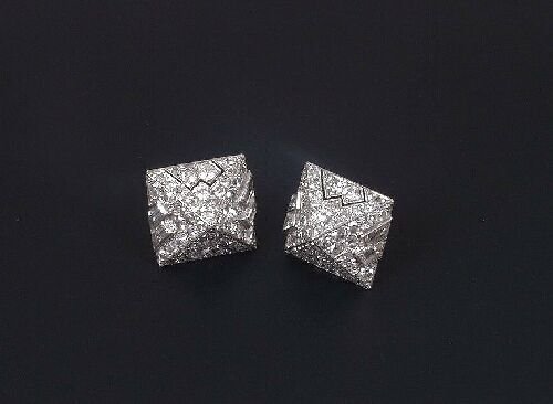 A pair of white gold diamond set pyrami