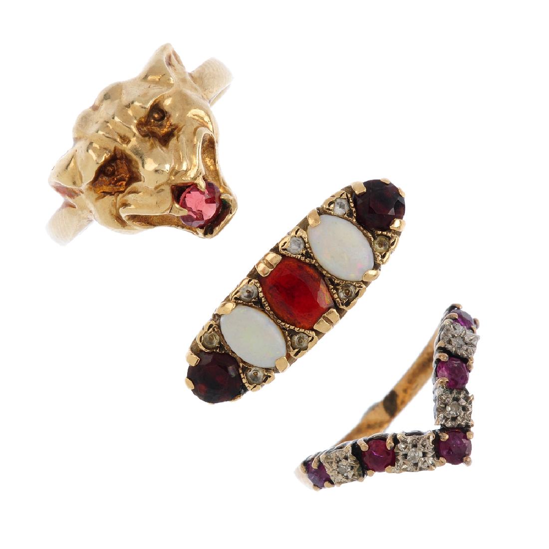Three 9ct gold gem-set rings. To include a opal and (1 of 3)